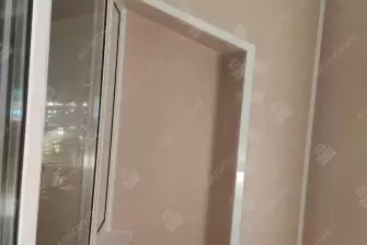 Обшивка балкона снаружи коричневым профнастилом