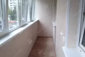 Остекление и отделка балкона Лодочка