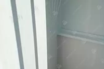 Остекление балкона и отделка стен