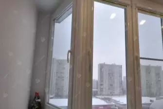 Теплое остекление балкона Сапожок окнами ПВХ Рехау